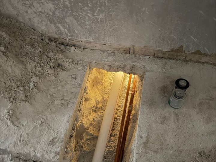 Drain and copper lines in an opened slab during a Miami Dade Plumbing repair